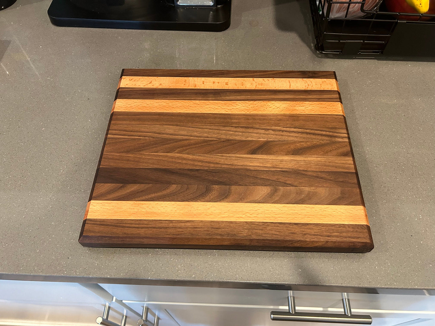 Beautiful Walnut and Beech edge grain cutting board. 10”x12”x1”