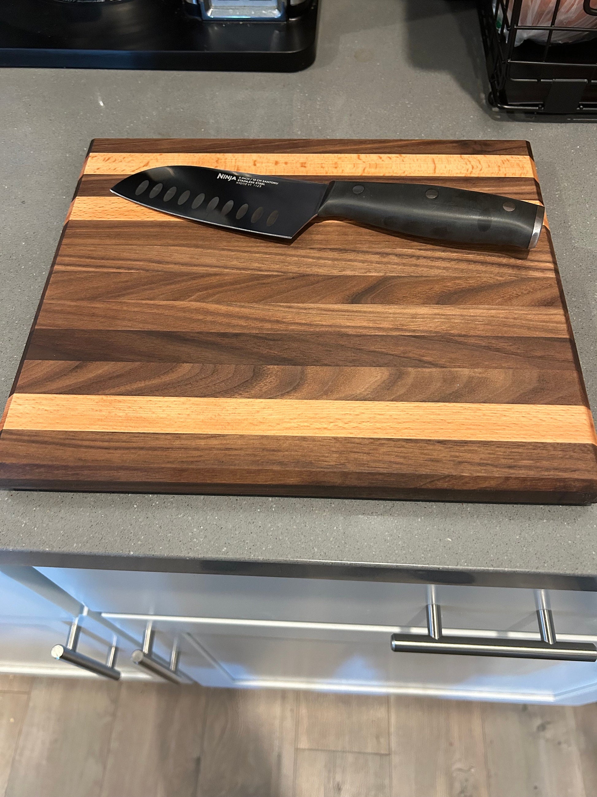 Beautiful Walnut and Beech edge grain cutting board. 10”x12”x1”