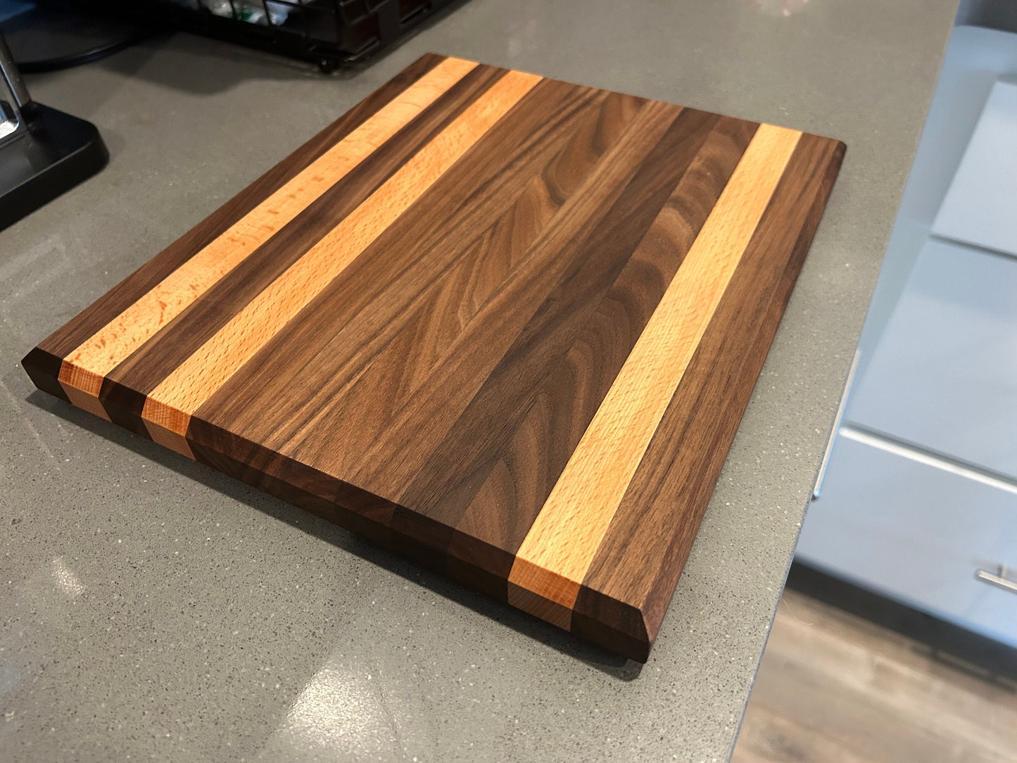 Beautiful Walnut and Beech edge grain cutting board. 10”x12”x1”